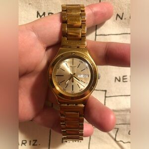 Swatch Unisex Gold-Tone Stainless Steel Watch - Gold
Swiss movement